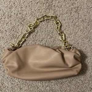 Cloud bag with heavy gold chain